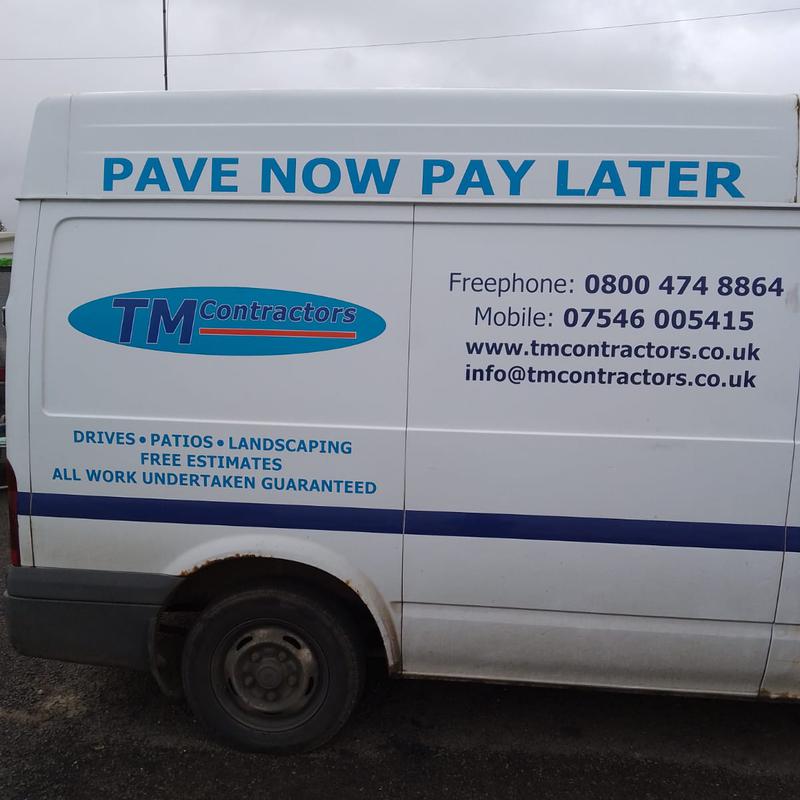 TM Contractors logo