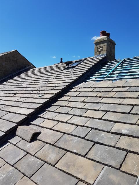Vanguard Roofing logo